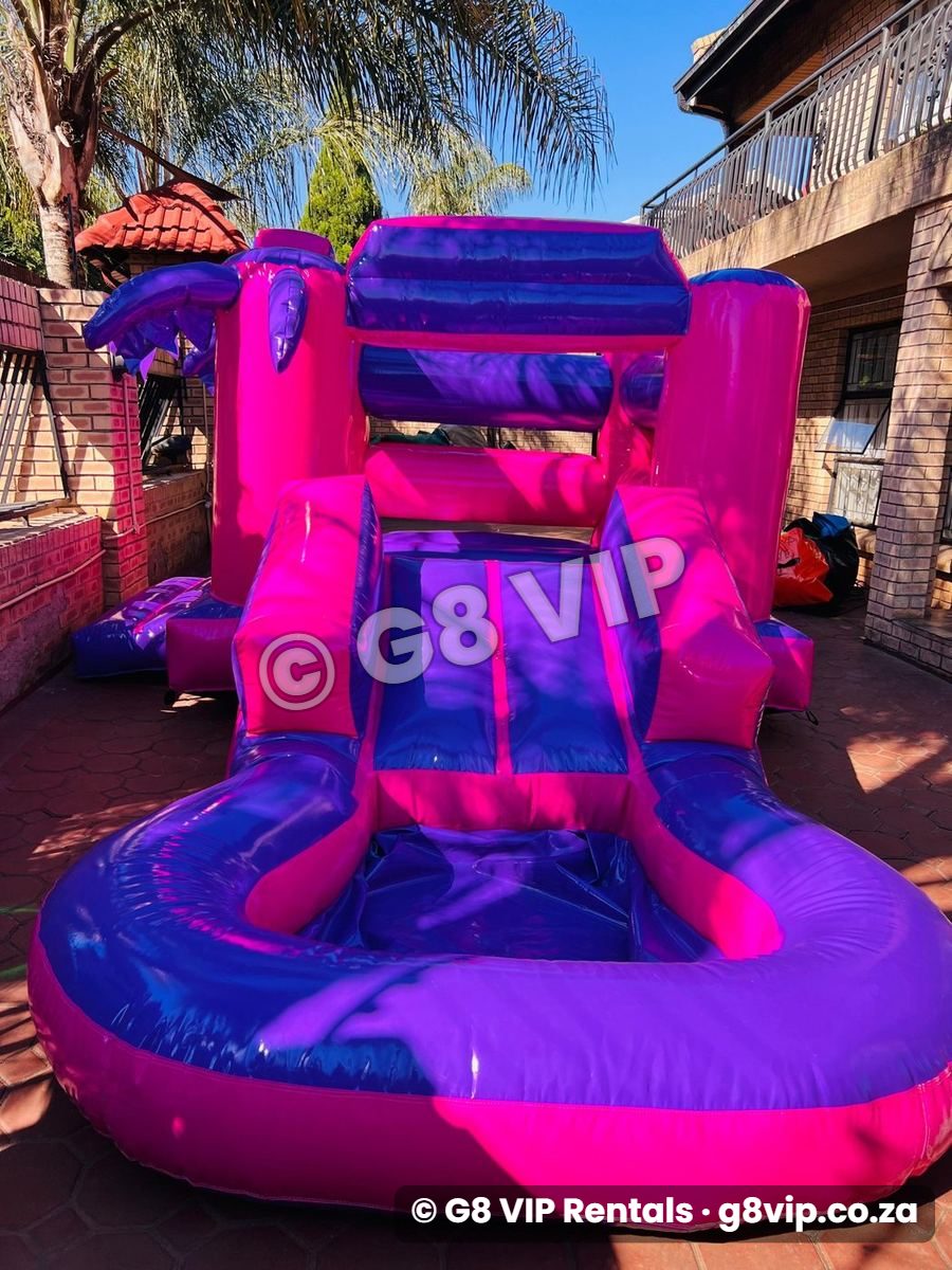 Purple Pink Castle jumping castle with slide and pool - slide and splash pool